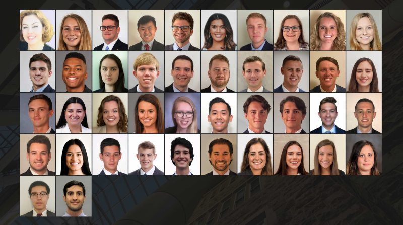 A grid of headshots of each of the members of MSBA-BA cohort 5 over top of a darkened view of the roof of Pamplin Hall.